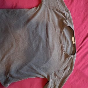 Long sleeve top. Kind of cropped.